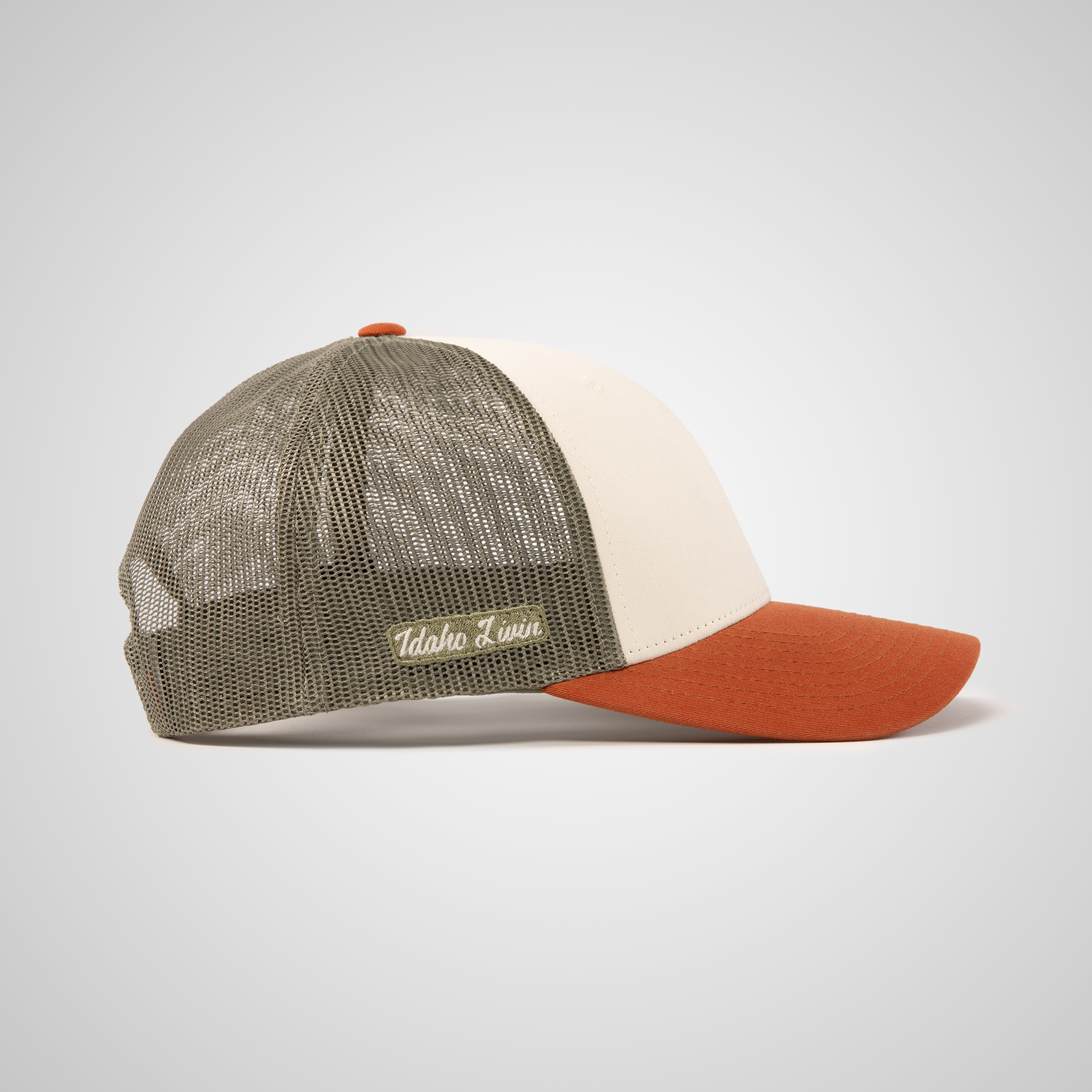 Low Profile Peak Trucker Hat | Cream/Loden/Orange