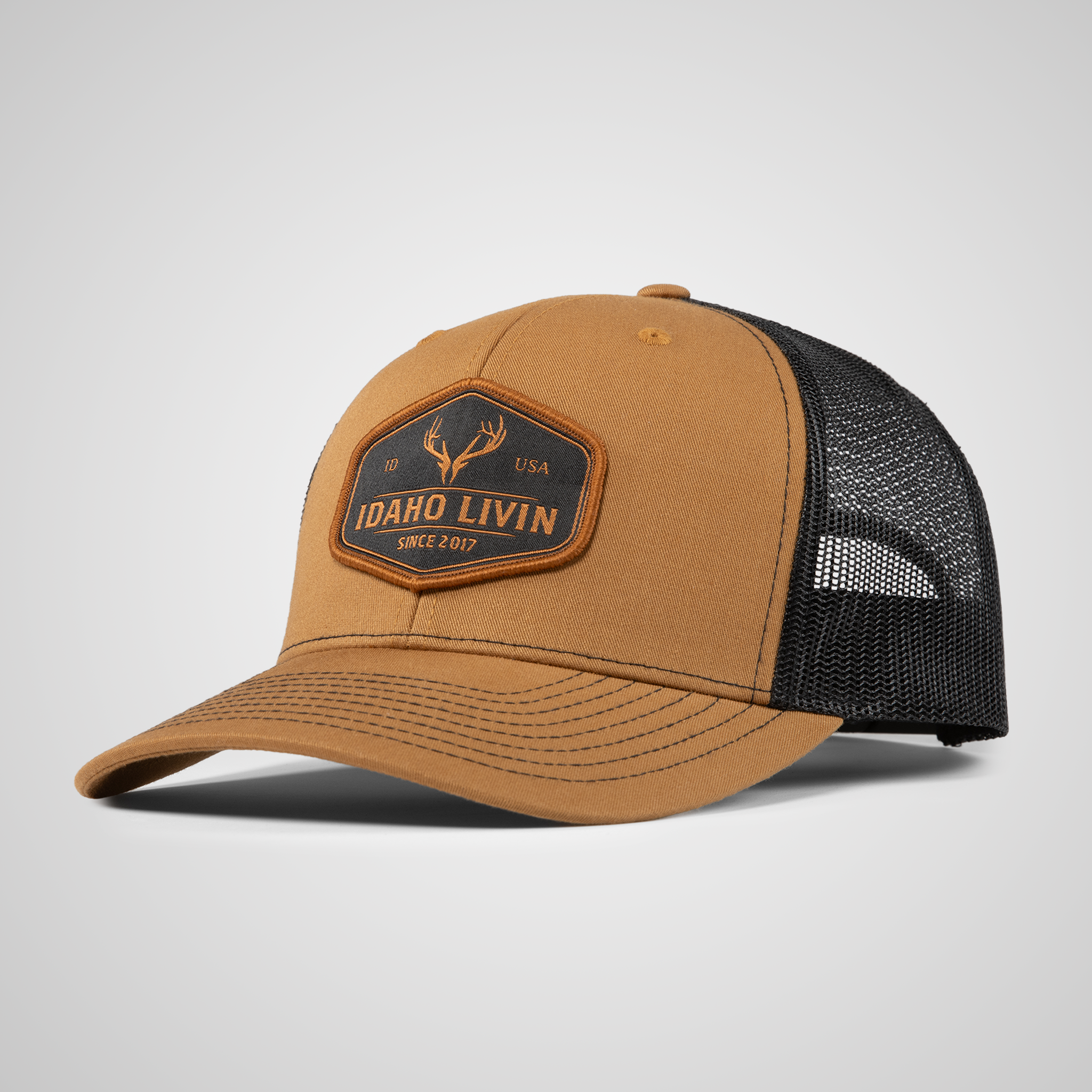 Elk Woven Patch Trucker Hat | Carmel/Black