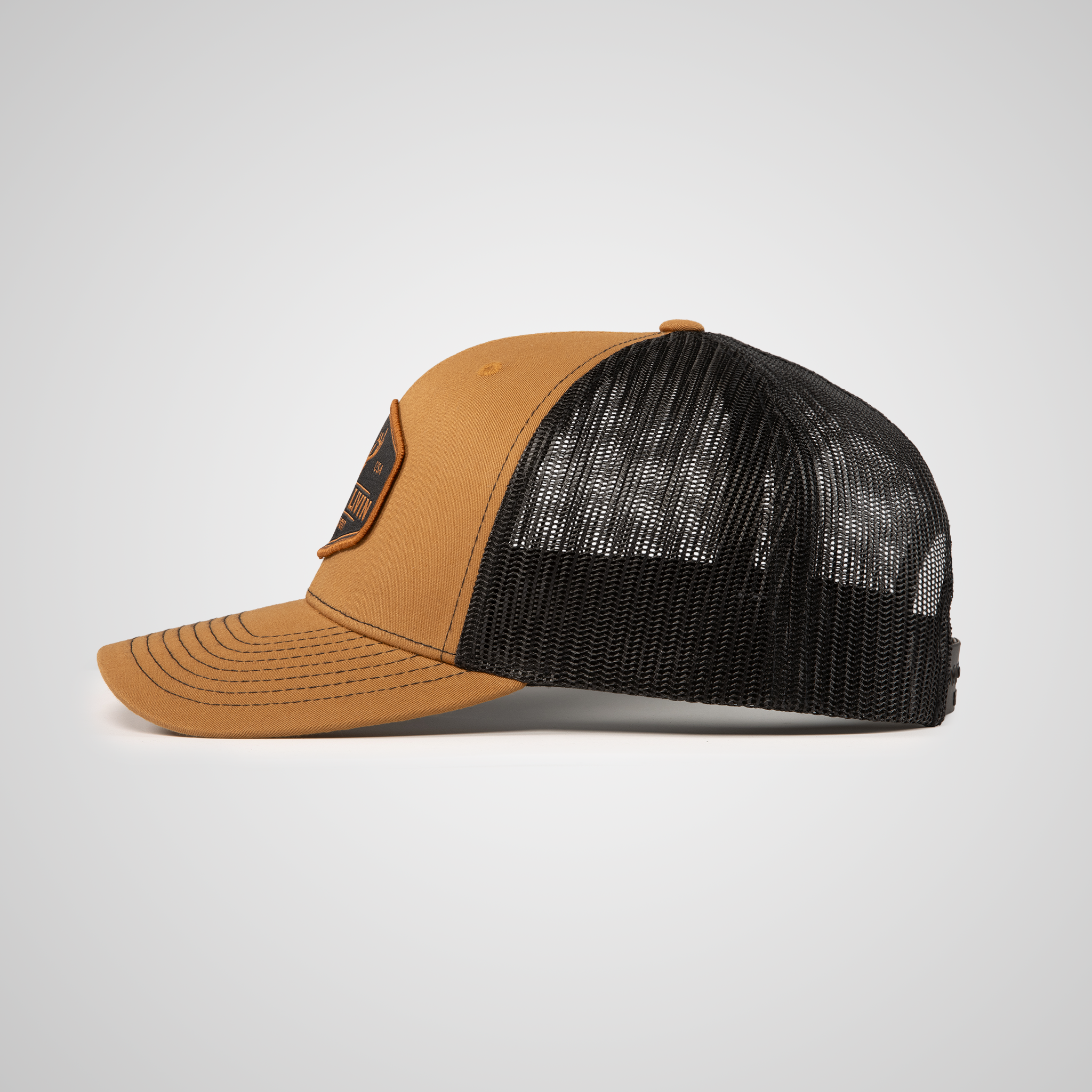 Elk Woven Patch Trucker Hat | Carmel/Black